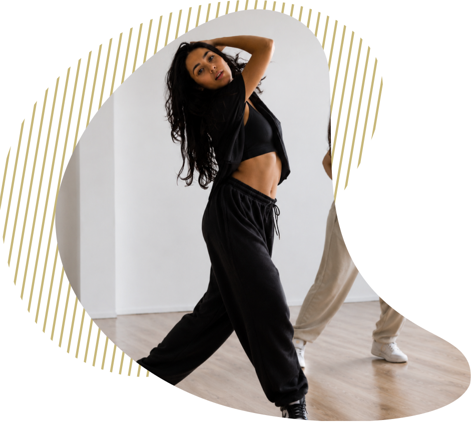 A dance class mid-choreography in the studio